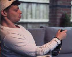 Alex Brooks (YouTube) consuming alcohol